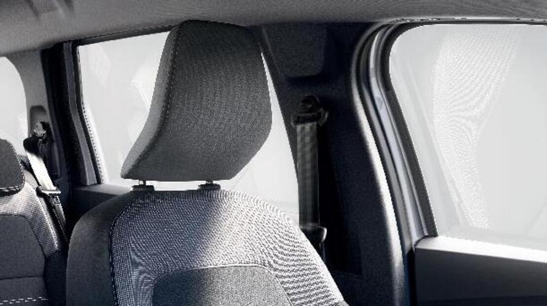 Front seat belt pretensioners